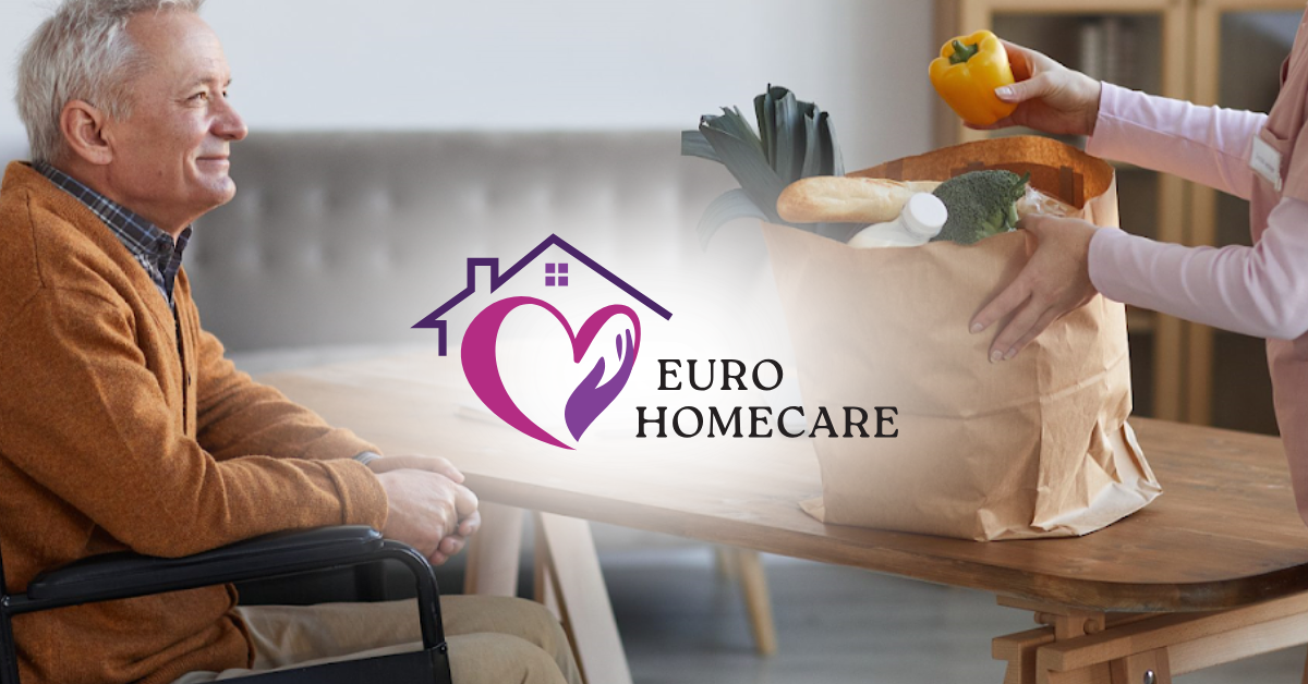 Home care worker handing groceries to a seated man beside a Euro Homecare logo.