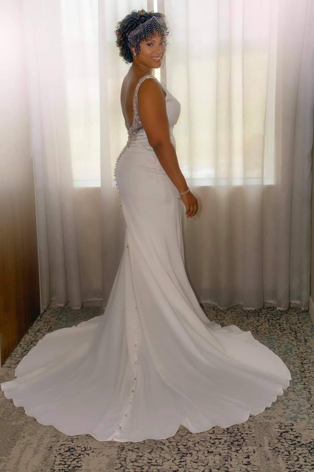 bridal portrait in front of window