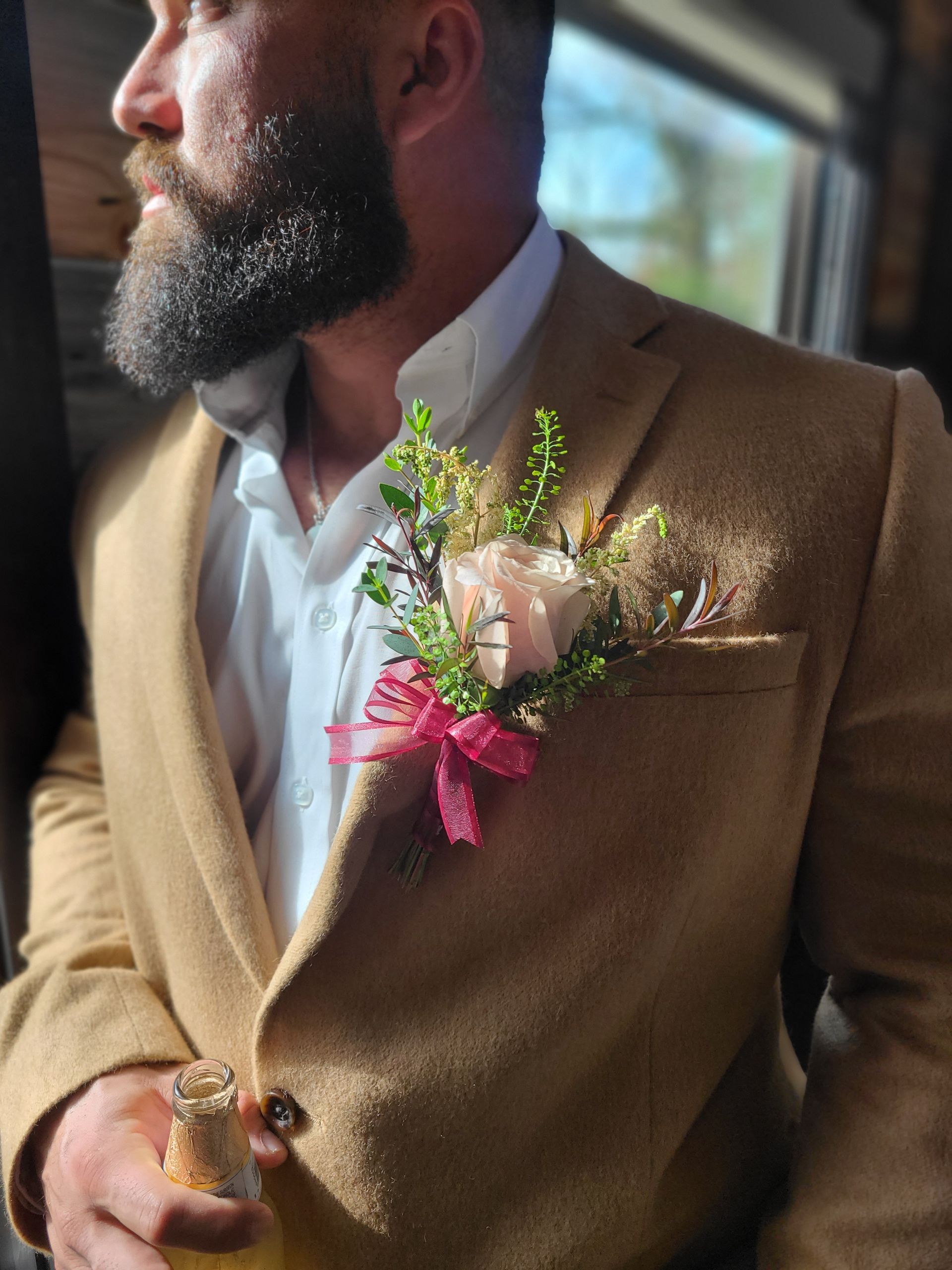 pink rose boutonniere