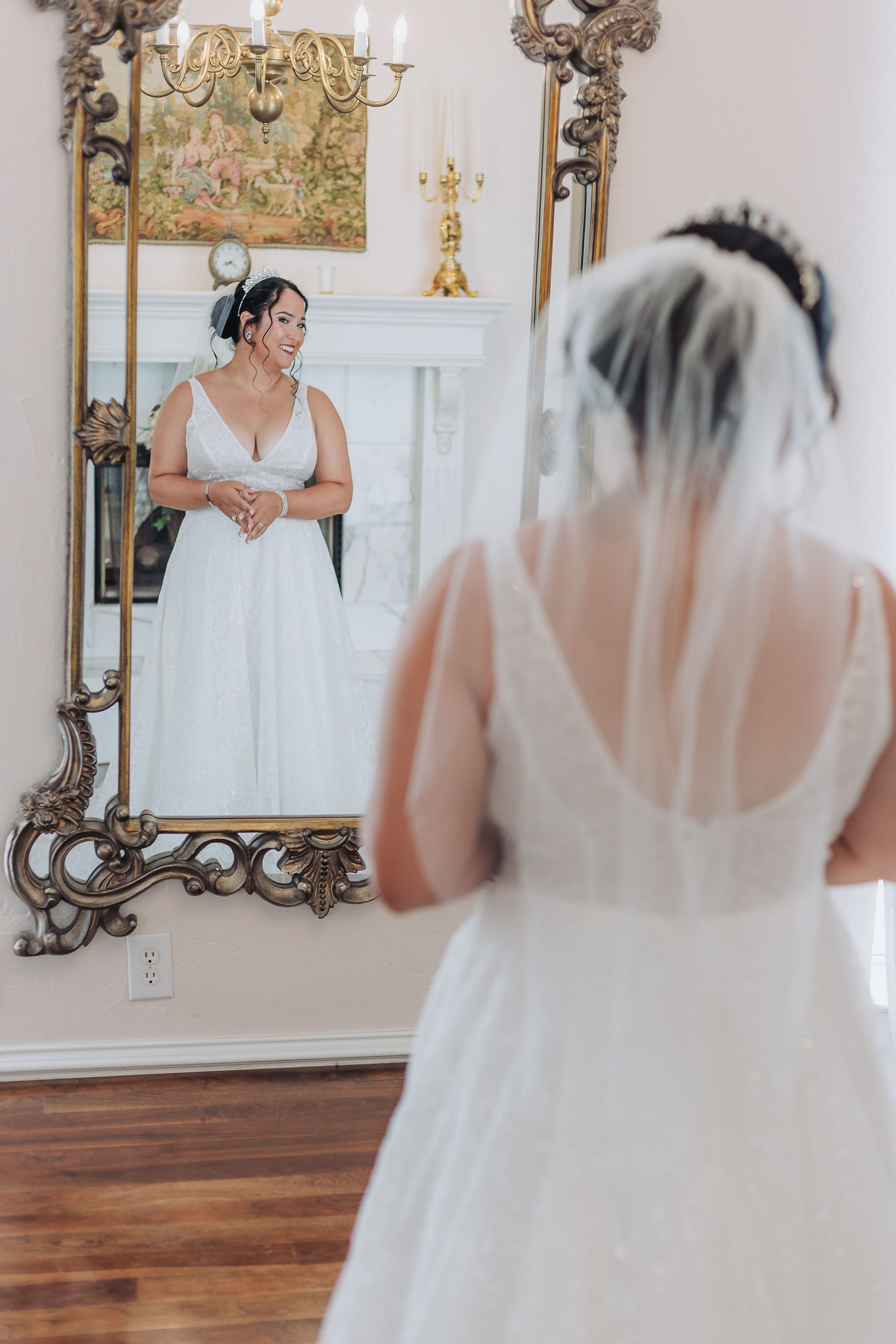 bride smiling in mirror