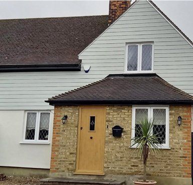before and after rendered cladding house Quality Render Specialists Basildon