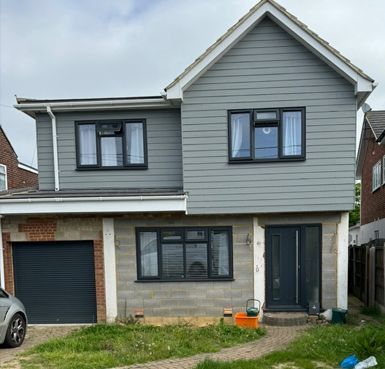 cladding and rendered house by Quality Render Specialists