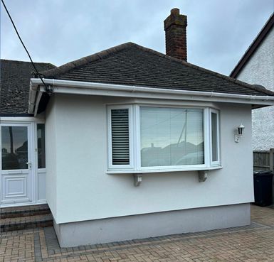 A bungalow which has been rendered by Quality Render Specialists