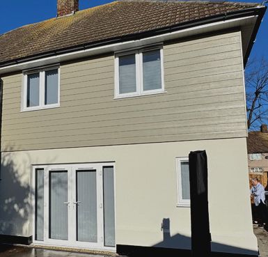 cladding an rendered house by Quality Render Specialists