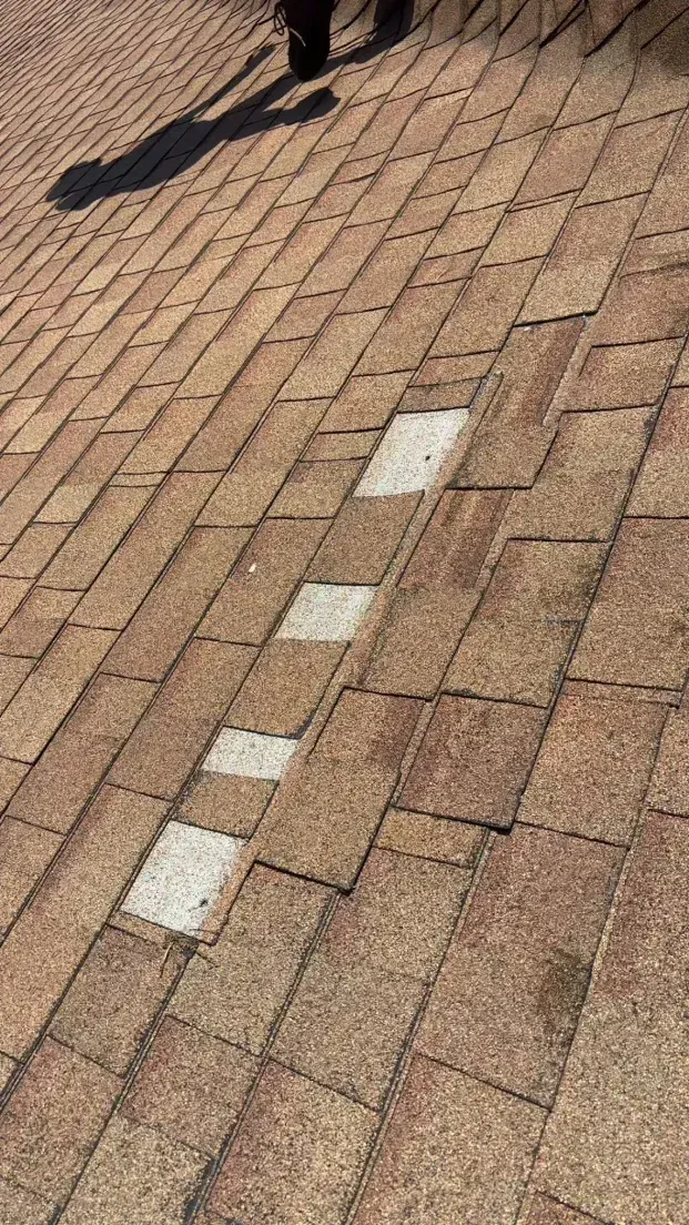 Before roof repair, missing roof shingle