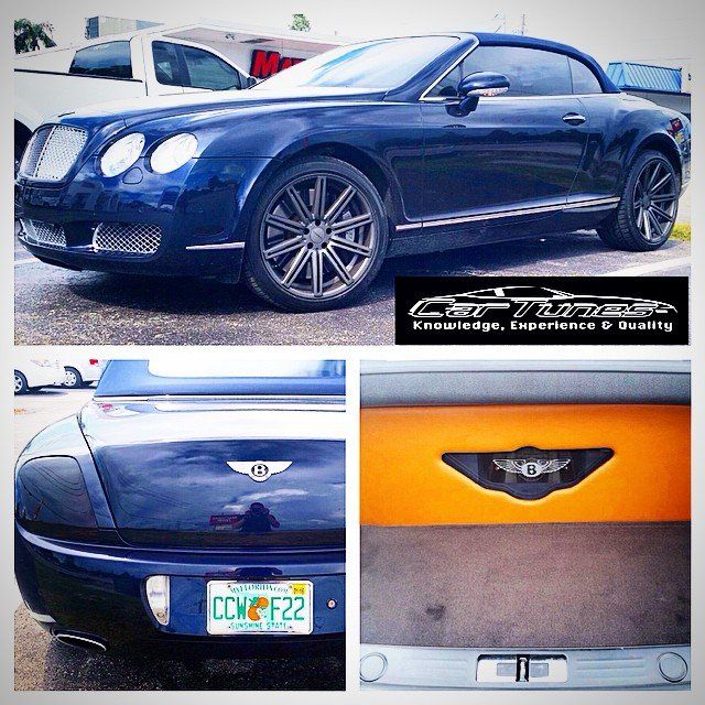 Blue Bentley convertible with custom interior and license plate in Florida.