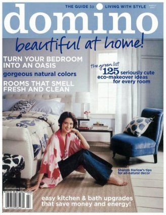 A woman sits on the cover of domino magazine