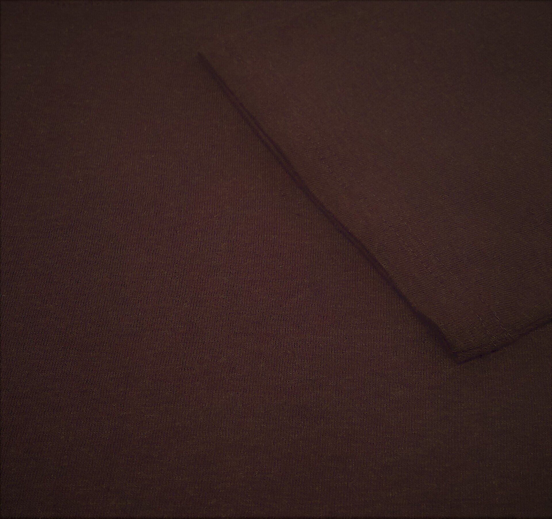 A close up of a piece of brown fabric