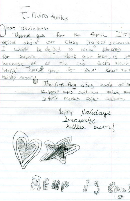 A letter is written on a piece of paper with hearts and stars on it.