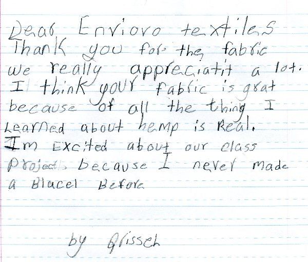 A handwritten note on a piece of paper that says thank you for the fabric