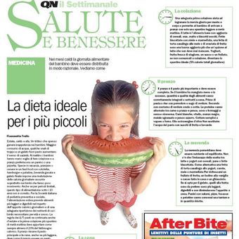 Copertina di una rivista italiana sull'alimentazione infantile, che mostra un bambino che tiene in mano una fetta di anguria