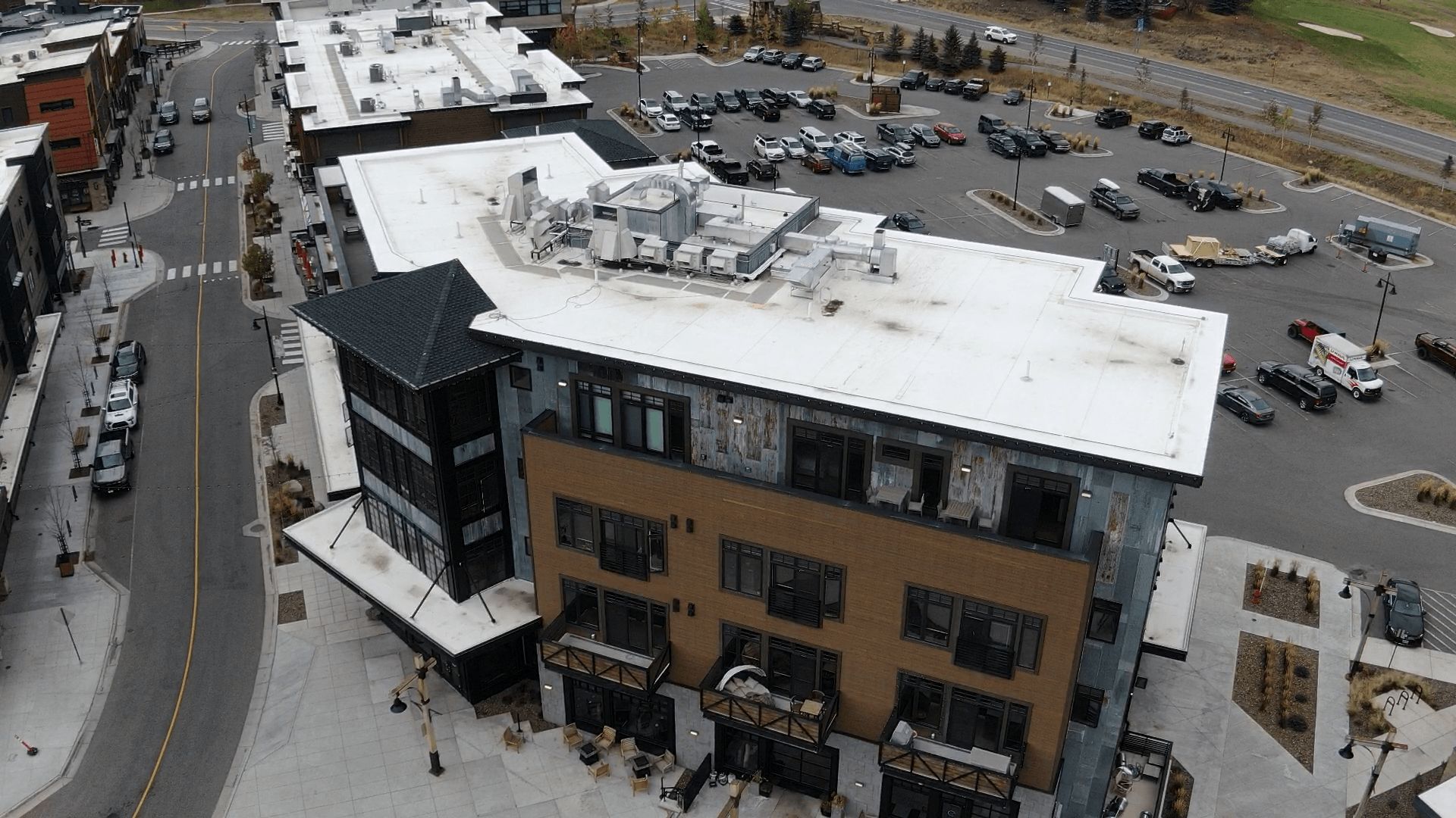 Aerial view of building with white roof — Missoula, MT — Summit Roofing