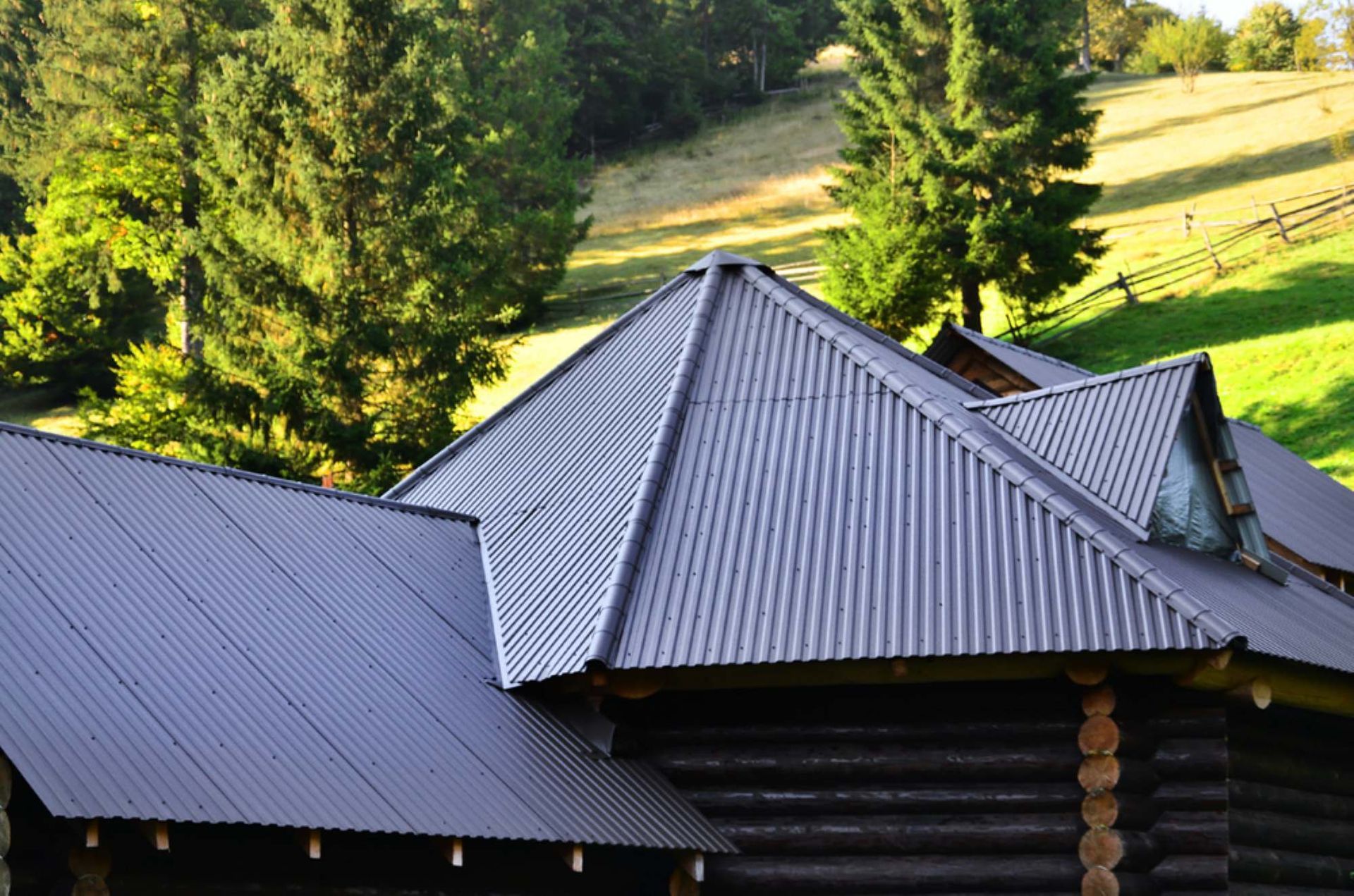A Close Up of a Gutter on a Roof With a black — Rhythm Roofing in Nambucca Heads, NSW
