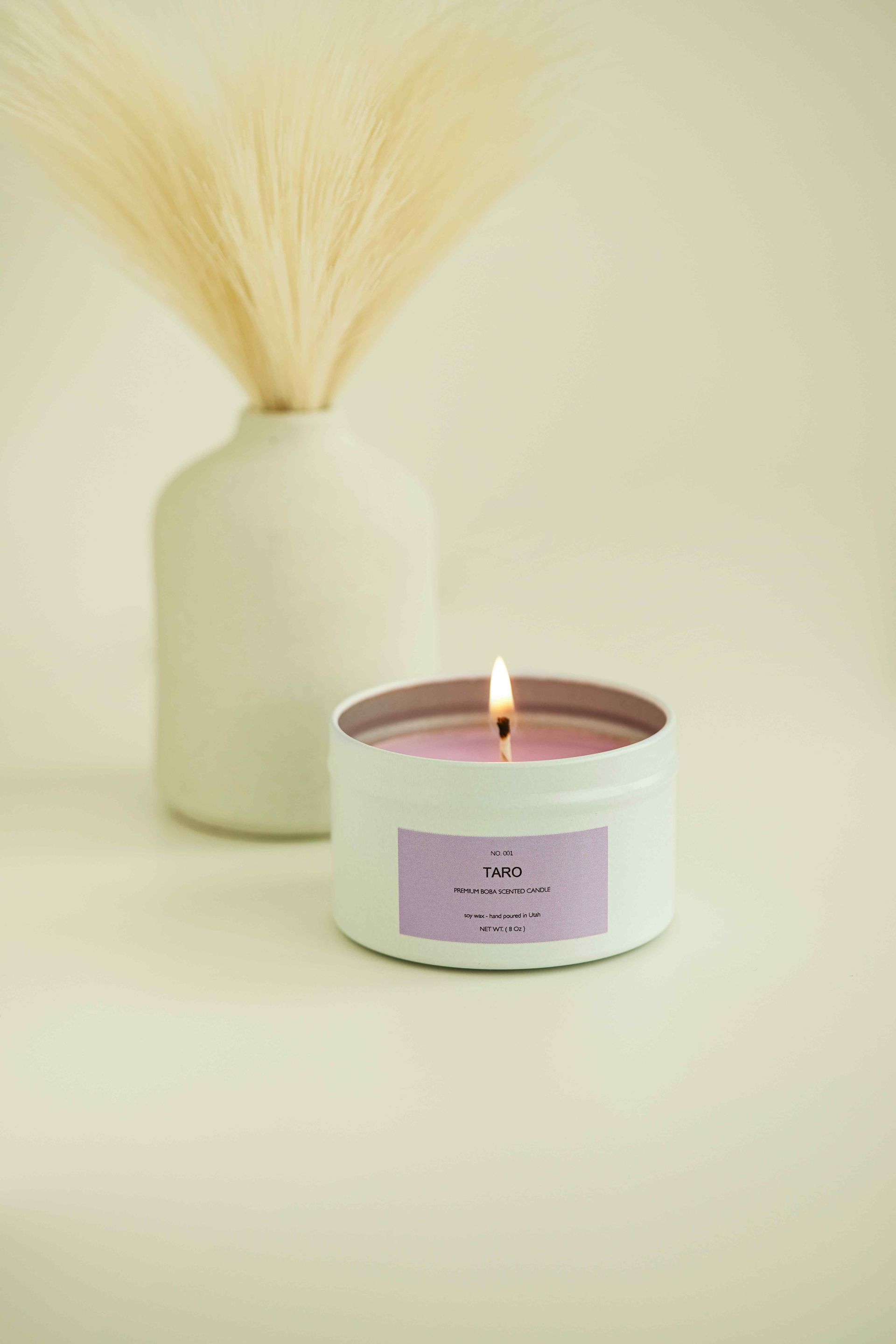 Taro scented BobaLuv candle lit