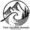Twin Vacation Rentals logo with mountains, wave, pine trees, and text