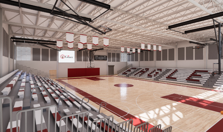 Basketball court with red and white bleachers, wooden floor, and the word 