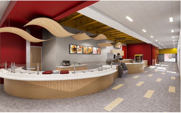 Restaurant interior with curved counters, red and yellow accents, and wavy wooden ceiling panels.