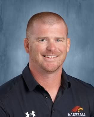 Baseball player wearing a red cap with