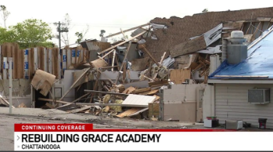 Damaged building with fallen roof, labeled