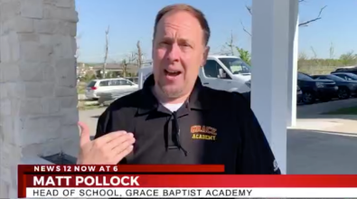 Matt Pollock, Head of School, Grace Baptist Academy, speaking outdoors. He's wearing a black polo shirt.