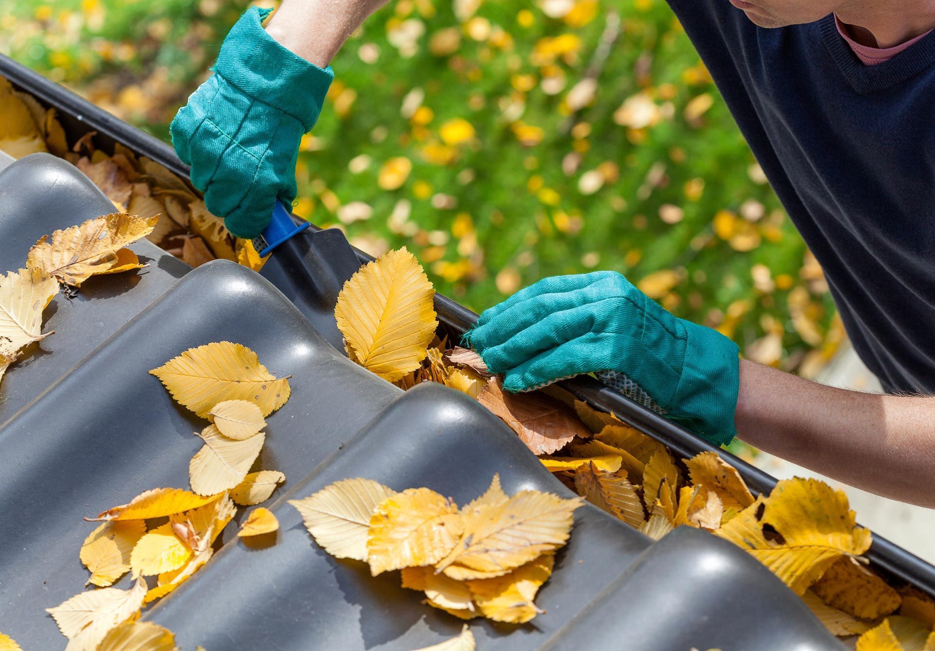 Removing Leaves On Gutter — Douglasville, GA — Tippens Gutter Services Removing Leaves On Gutter — Douglasville, GA — Tippens Gutter Services
