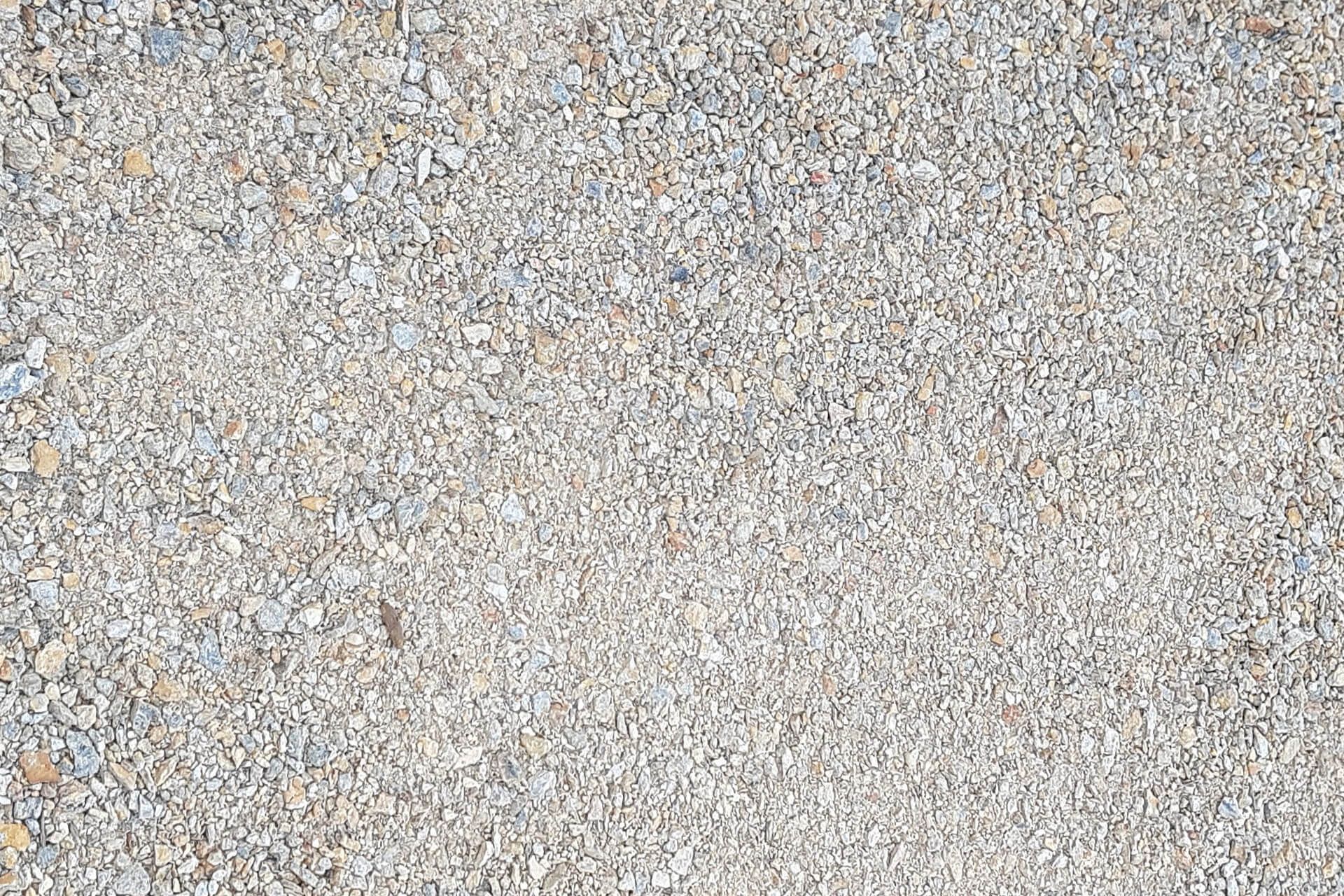 Gravel path, small light gray and tan stones.