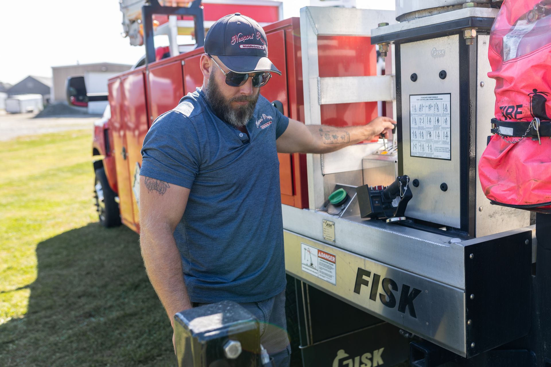Newport Propane technician standing in front, ready for propane line installation for backup generators in Middletown, RI