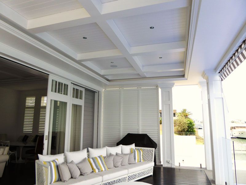 White room with sofa — Manufacturing Cornices in Logan Village, QLD