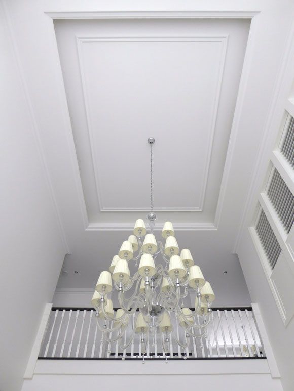Chandelier hanging in the ceiling — Manufacturing Cornices in Logan Village, QLD