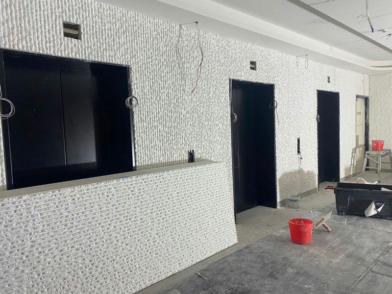 Working on Custom Stone Walls — Custom Cornices in Logan Village, QLD