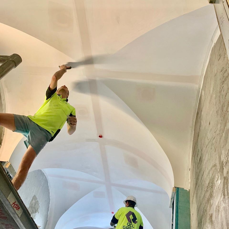 LeBain Apartments Vaulted White Installing — Custom Cornices in Logan Village, QLD