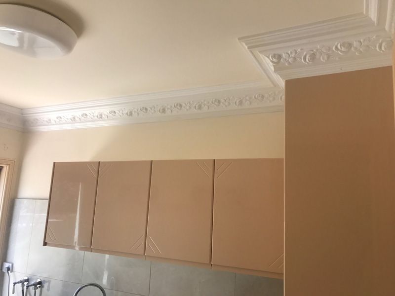 Beige cabinet — Manufacturing Cornices in Logan Village, QLD