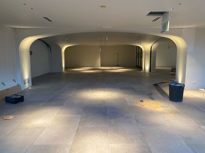 Empty room with lights — Manufacturing Cornices in Logan Village, QLD