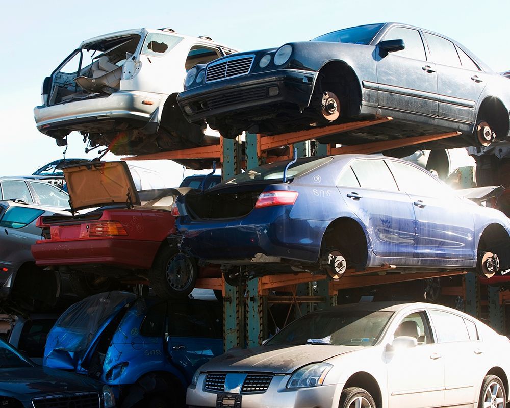 Junk cars in a salvage yard at Ace Auto Salvage, a leading junk car buyer in West Allis, WI