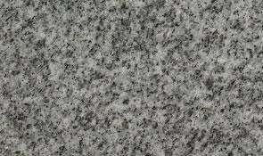 A close-up view of a grey and white mottled granite texture.
