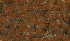 A close-up texture of granite stone featuring a mottled pattern of deep orange, brown, and speckled grey mineral grains.