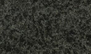 A close-up of dark grey, speckled granite stone texture with mottled black and charcoal flecks.