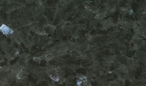 A close-up view of dark green marble with irregular, subtle black veining and occasional white flecks.