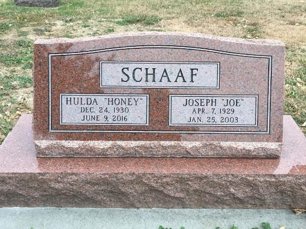 Red granite headstone for the Schaaf family, inscribed with names Hulda 