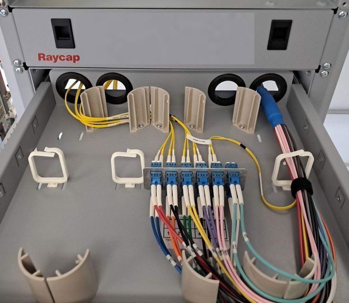 A raycap box with a bunch of wires in it