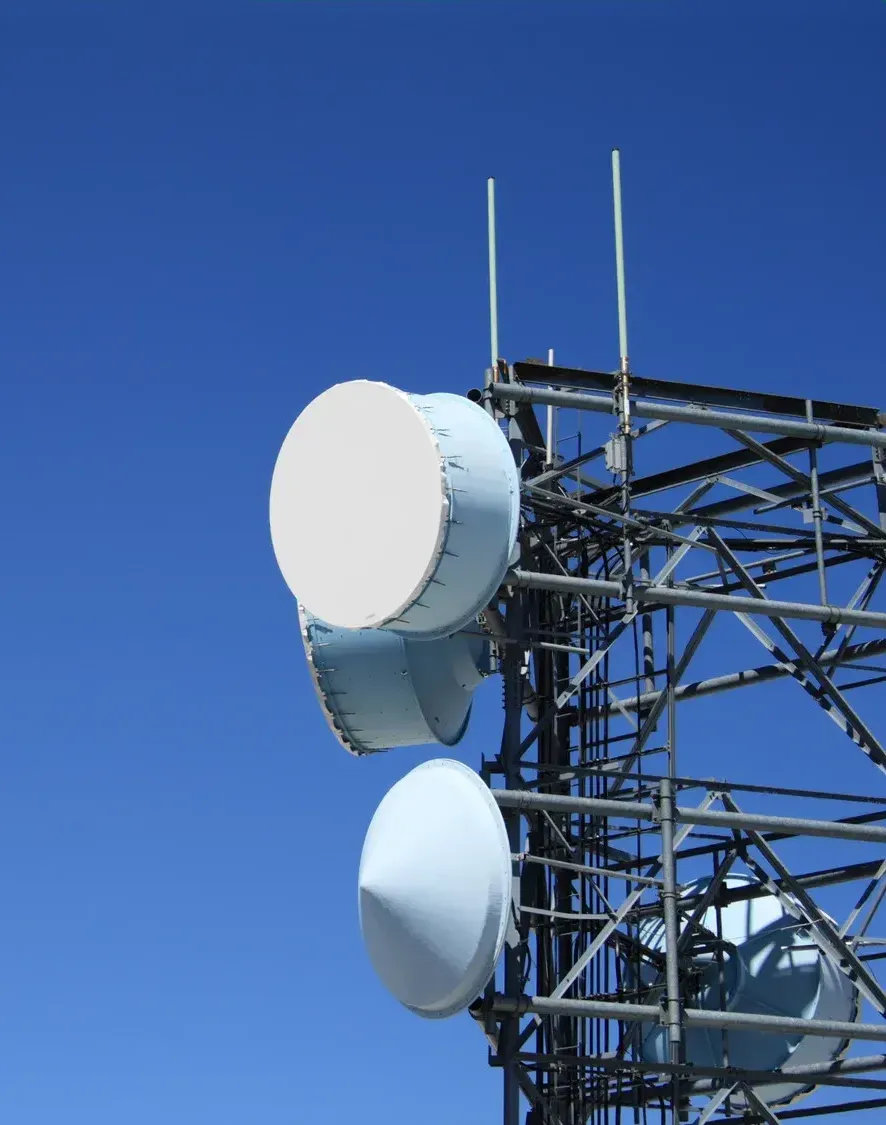 A tower with a blue sky in the background
