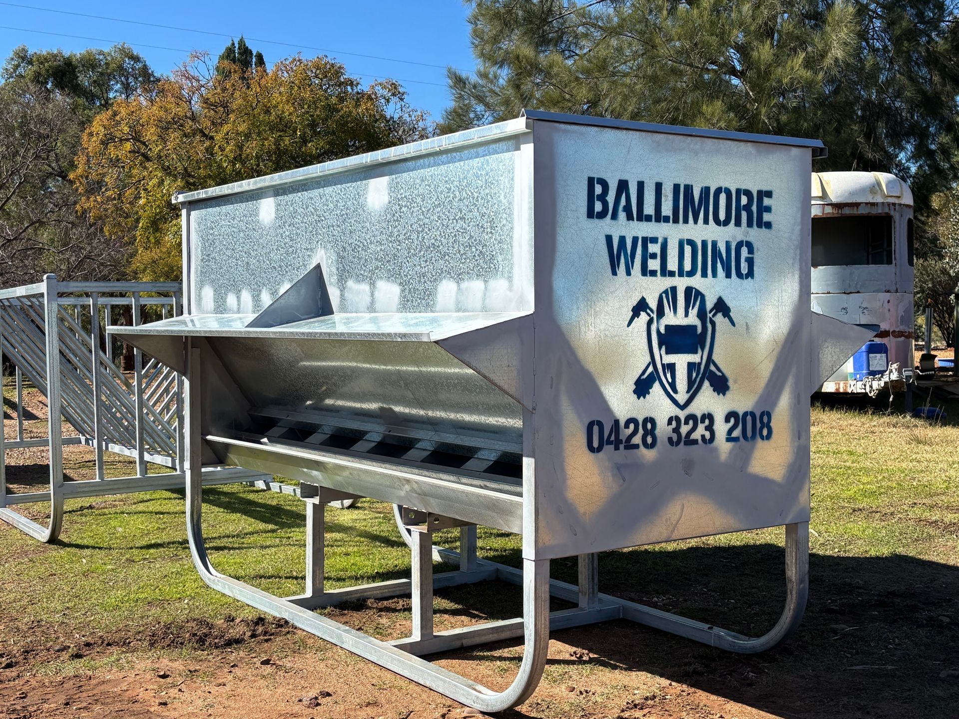 Metal livestock feeder with