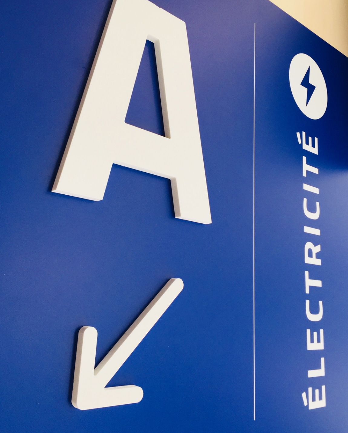 Blue sign with white 