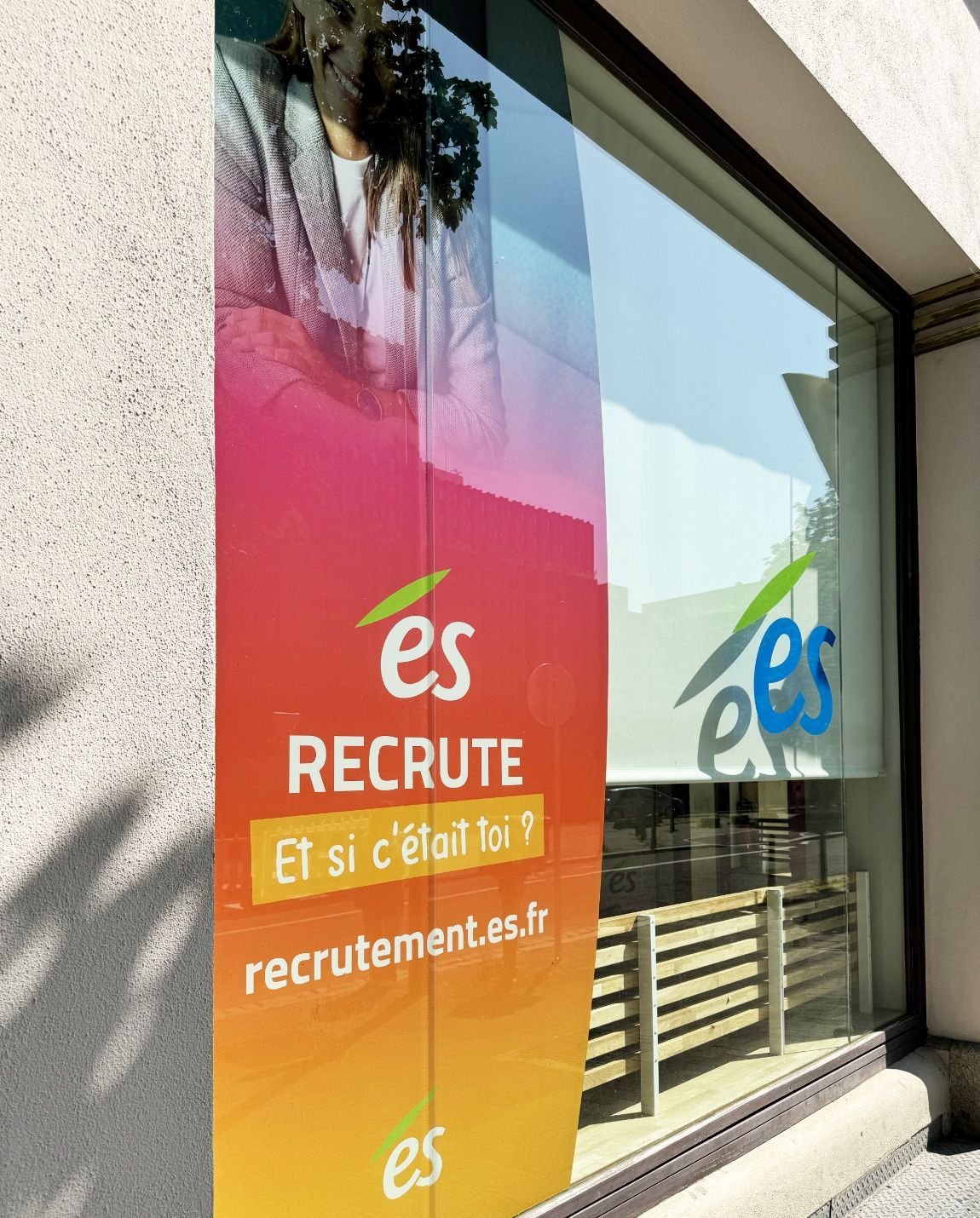 Colorful banner on a building window. 