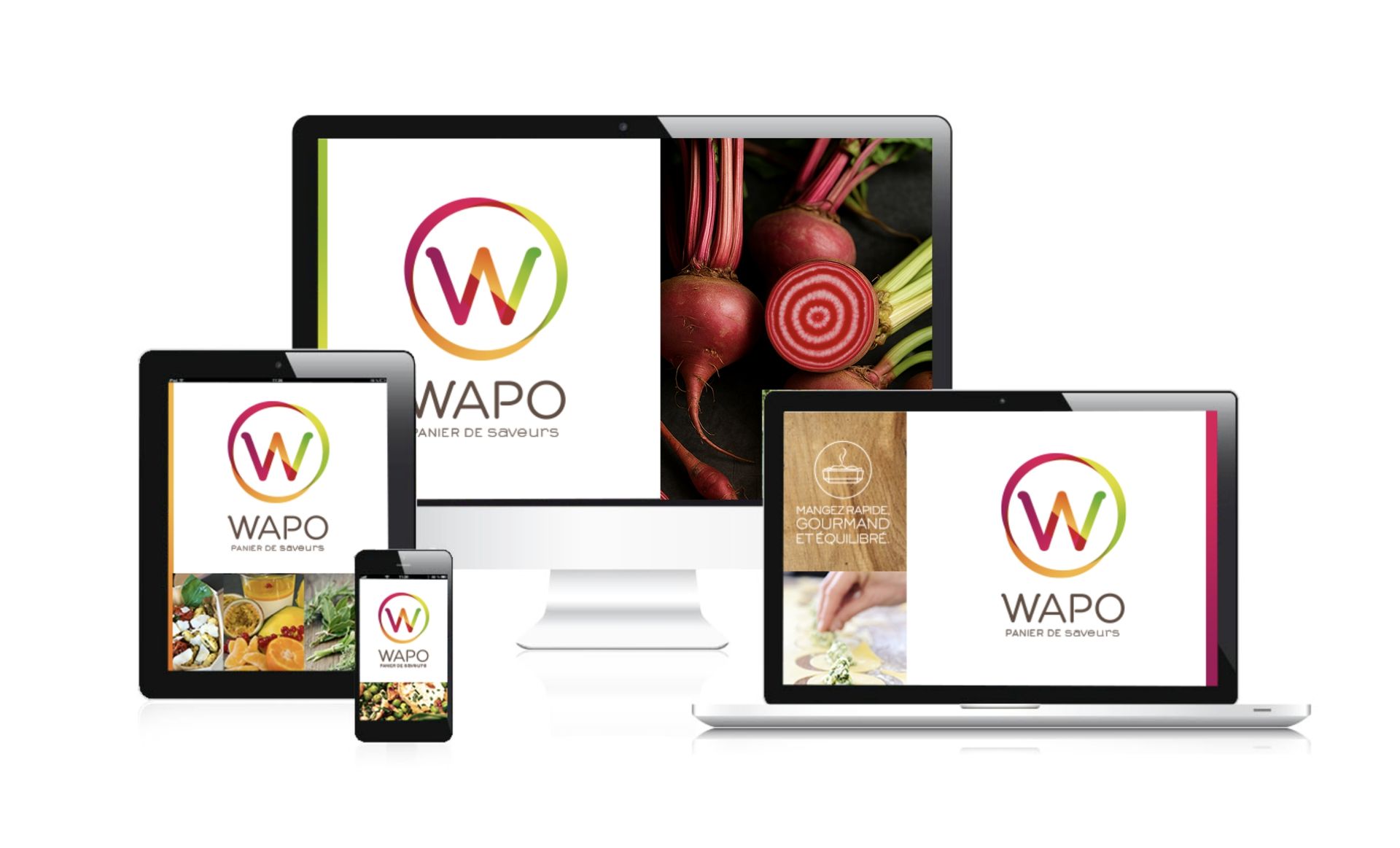 Four digital devices displaying a website mockup with a colorful