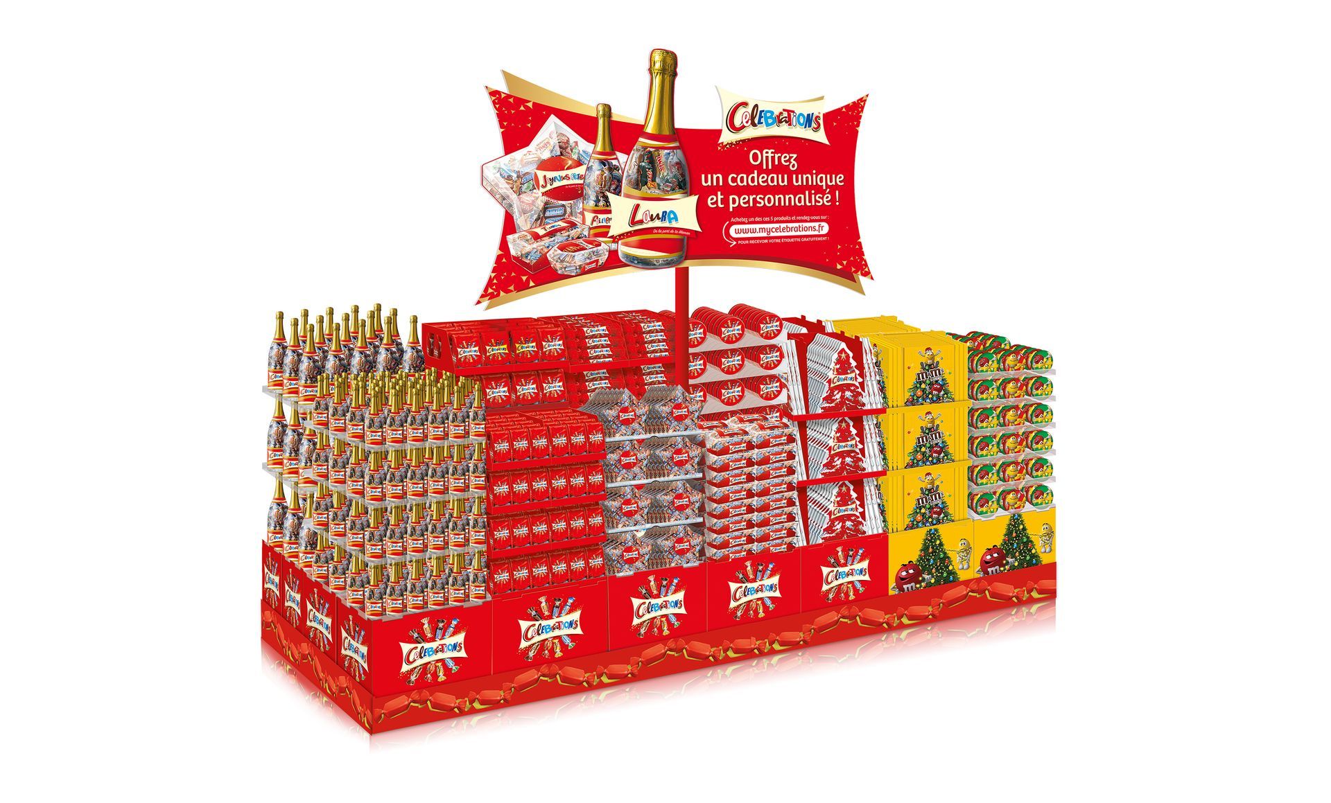 Display stand filled with red and yellow packaged products, topped with a promotional sign.