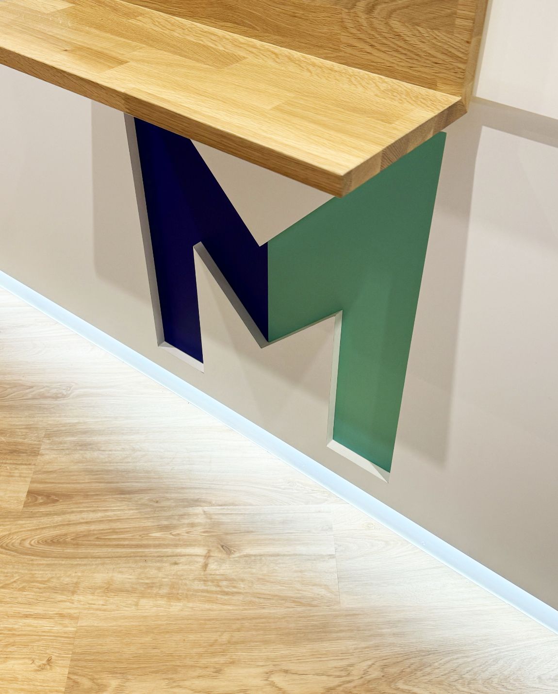 Wooden desk with blue and green 