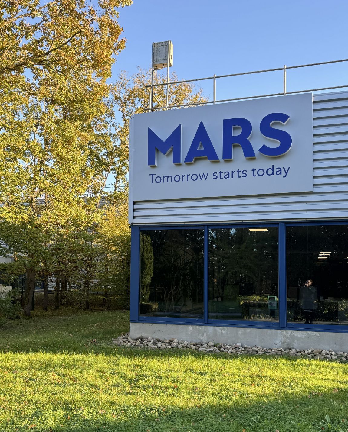 MARS sign on building with the slogan, 
