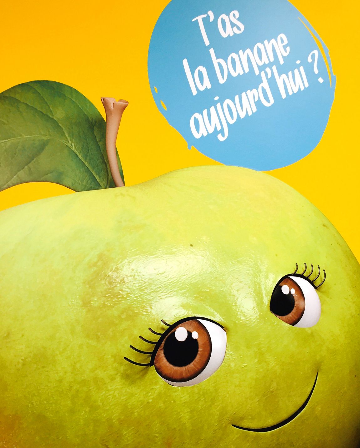 Green apple with cartoon eyes and a speech bubble asking, 