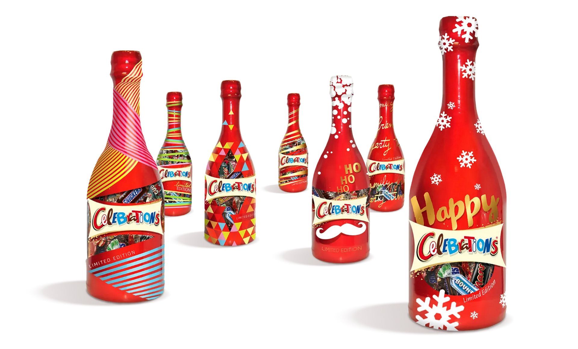 Seven decorated red bottles, possibly champagne or sparkling cider, with Christmas and holiday designs.